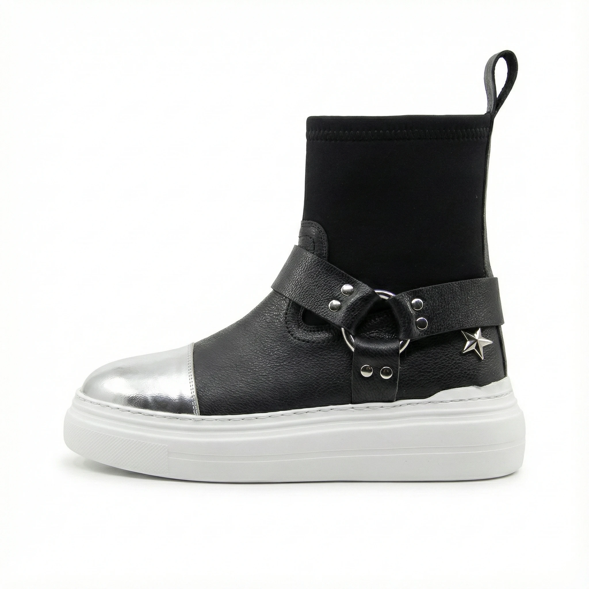 Black leather sock boot with silver toe cap, studded wrap strap, star charm, pull tab, and white platform sole.