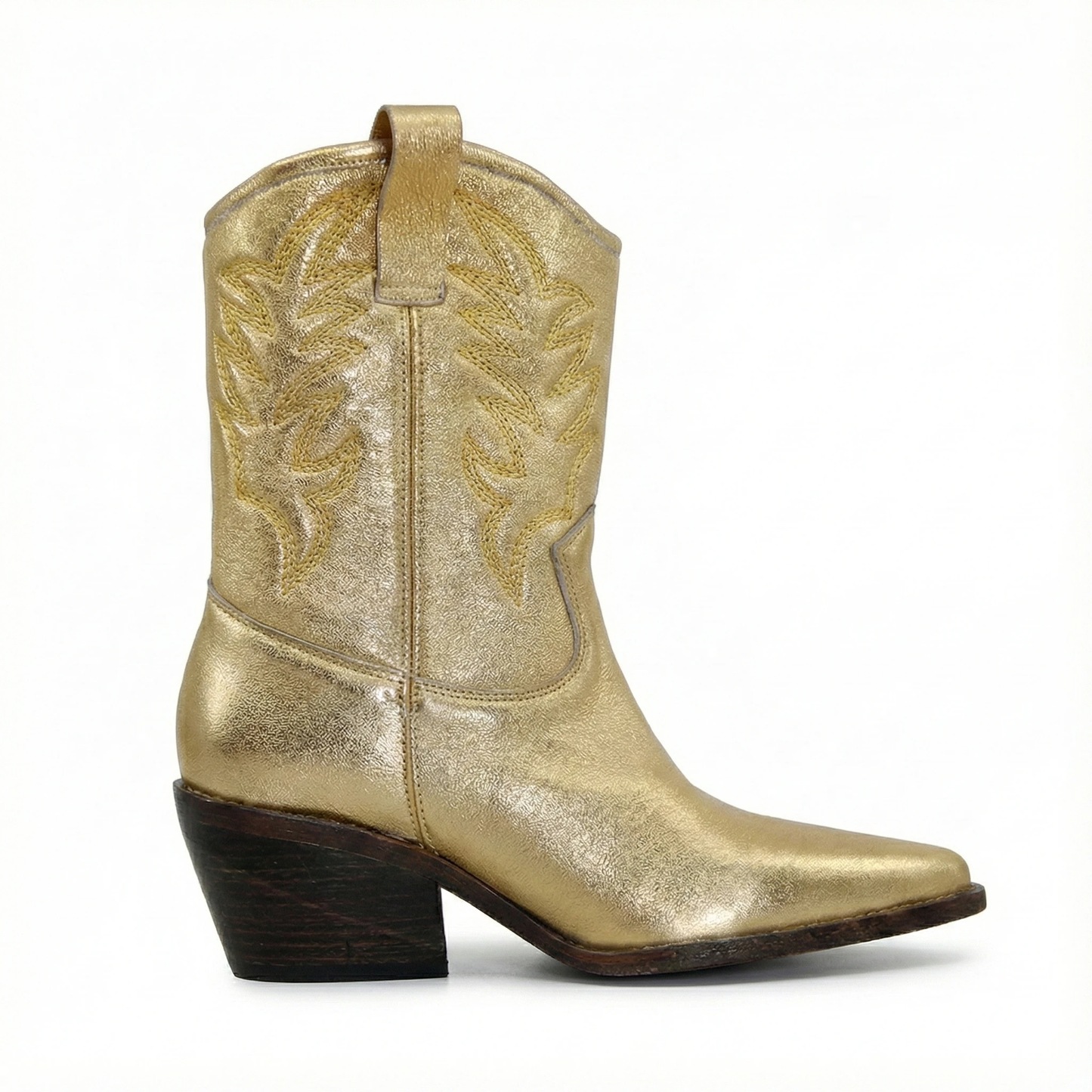 Metallic gold Western ankle boot with embroidered shaft pattern, pull tab, almond toe, and stacked wooden heel.