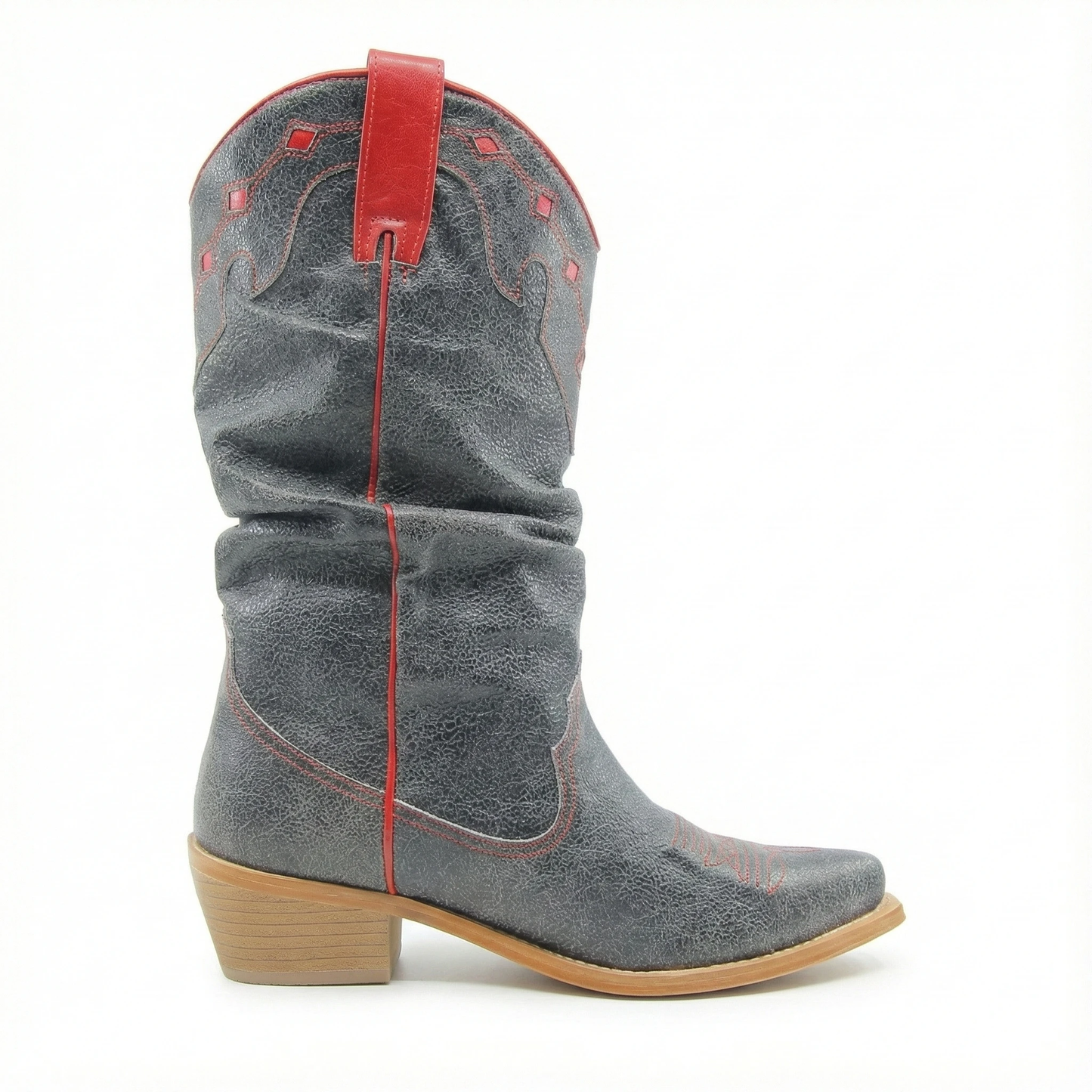 Side view of grey distressed leather Western boot with red piping, red top strap, and tan stacked heel.