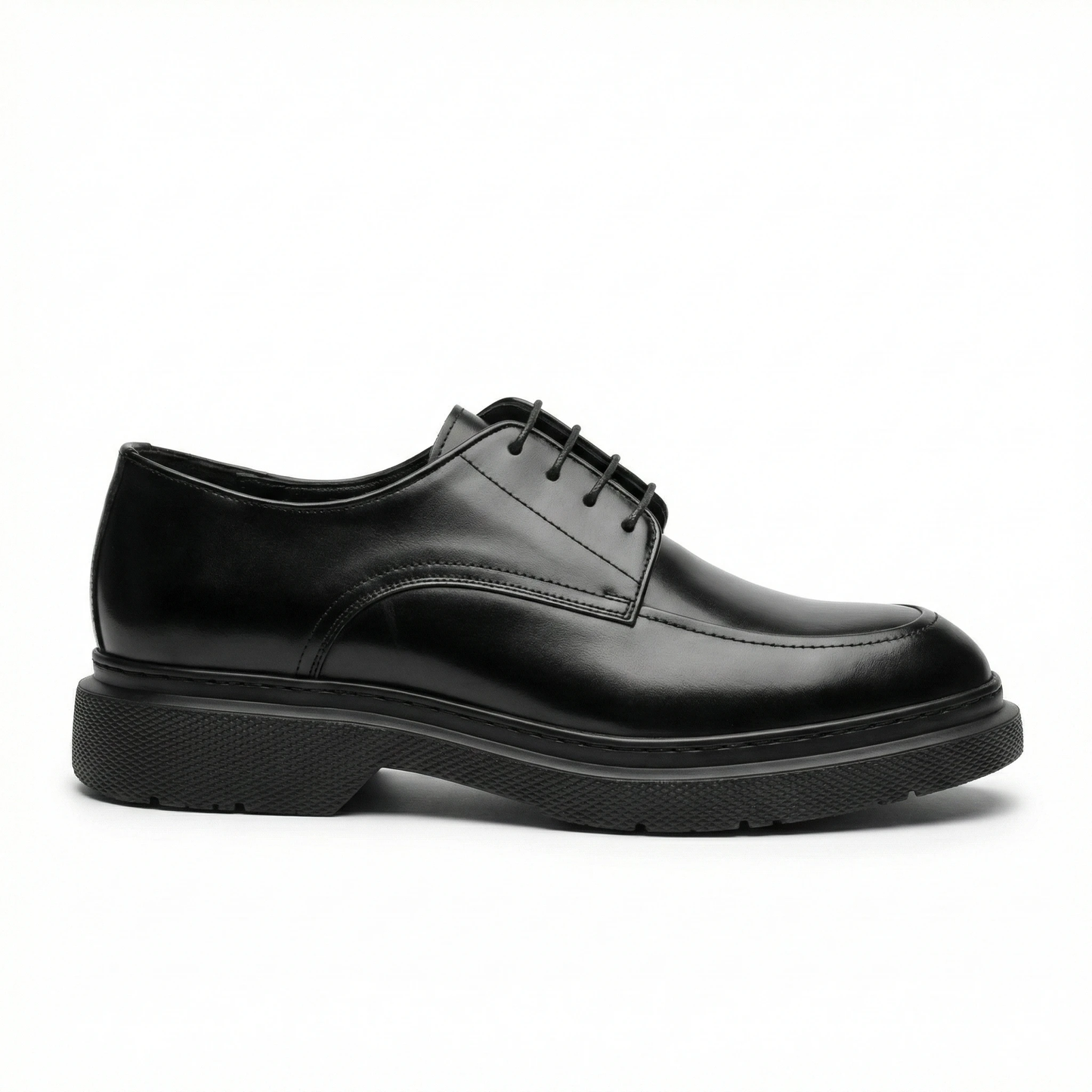 Black genuine leather men's chunky derby shoe with a thick lug sole, lace-up front, rounded toe, and visible stitching.