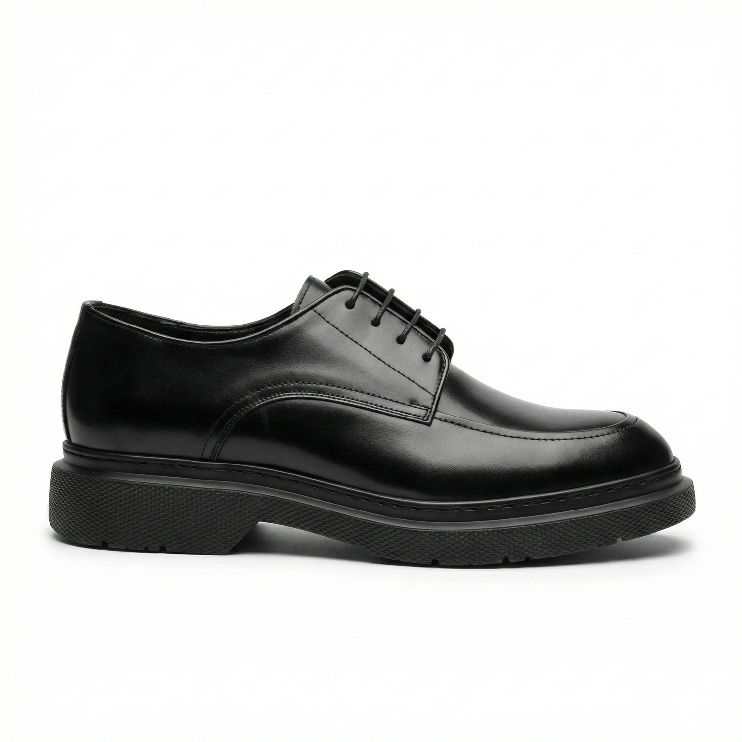Black genuine leather men's chunky derby shoe with a thick lug sole, lace-up front, rounded toe, and visible stitching.